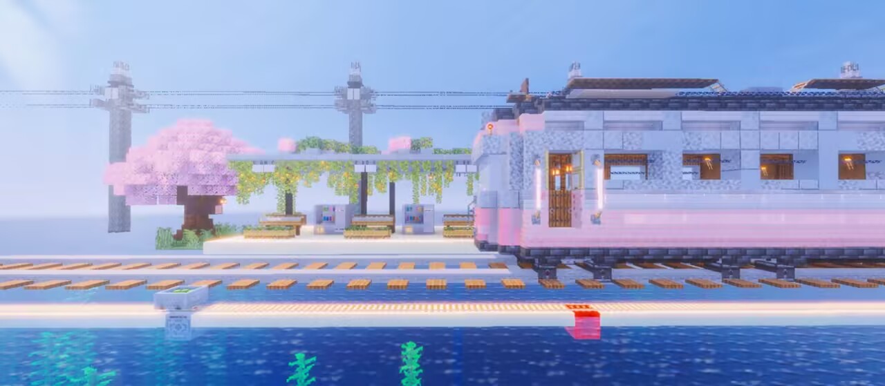 安安Anan0v0 的摄影作品《通往夏天的隧道》:粉色列车经过海边车站